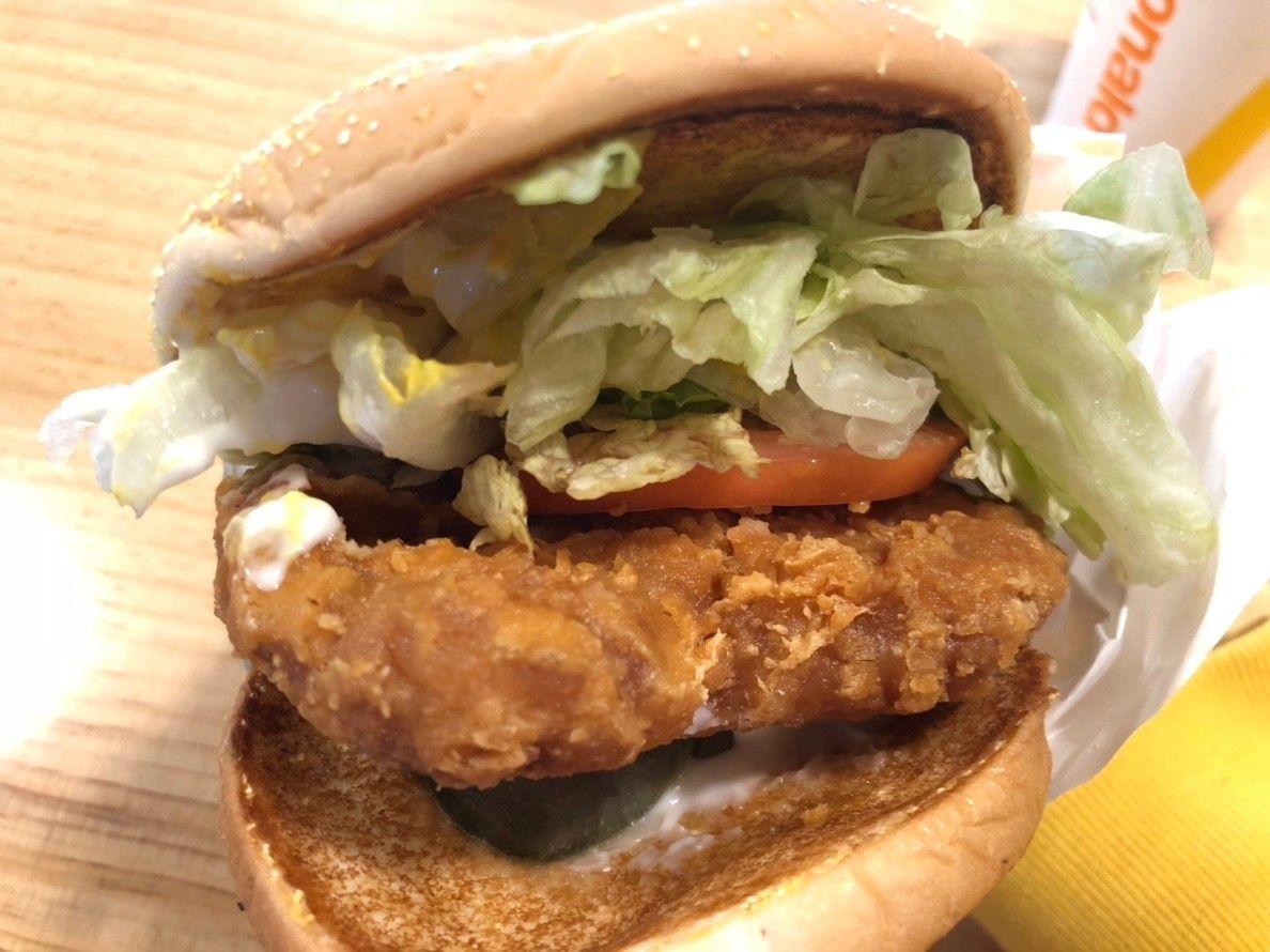 Crispy Oriental Chicken Burger wrapped in McDonald's Korea branded packaging.